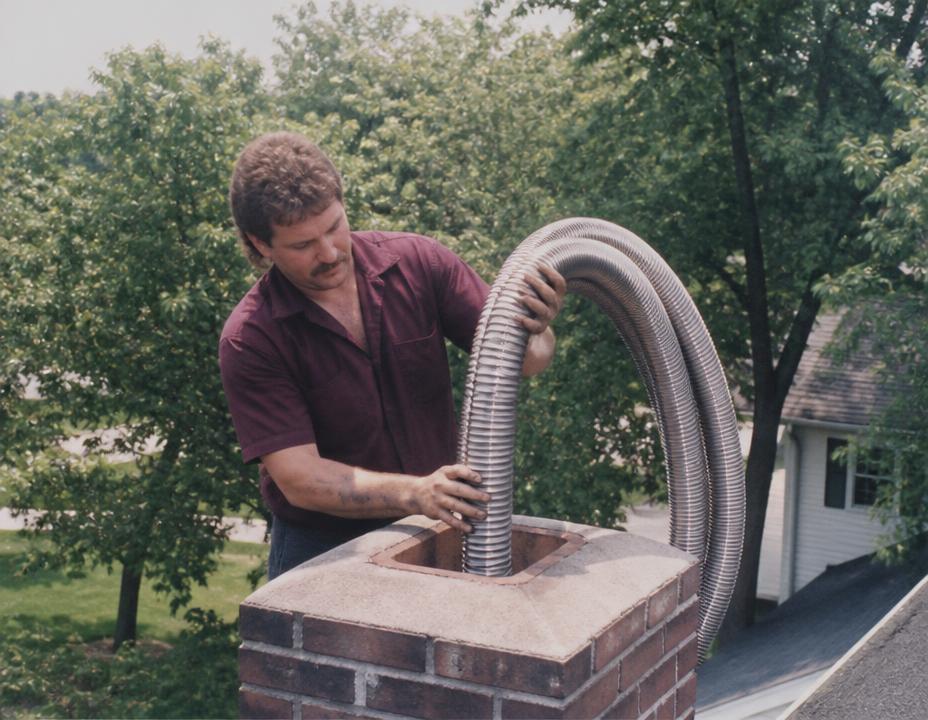 Noble Chimney technician — Chimney Relining