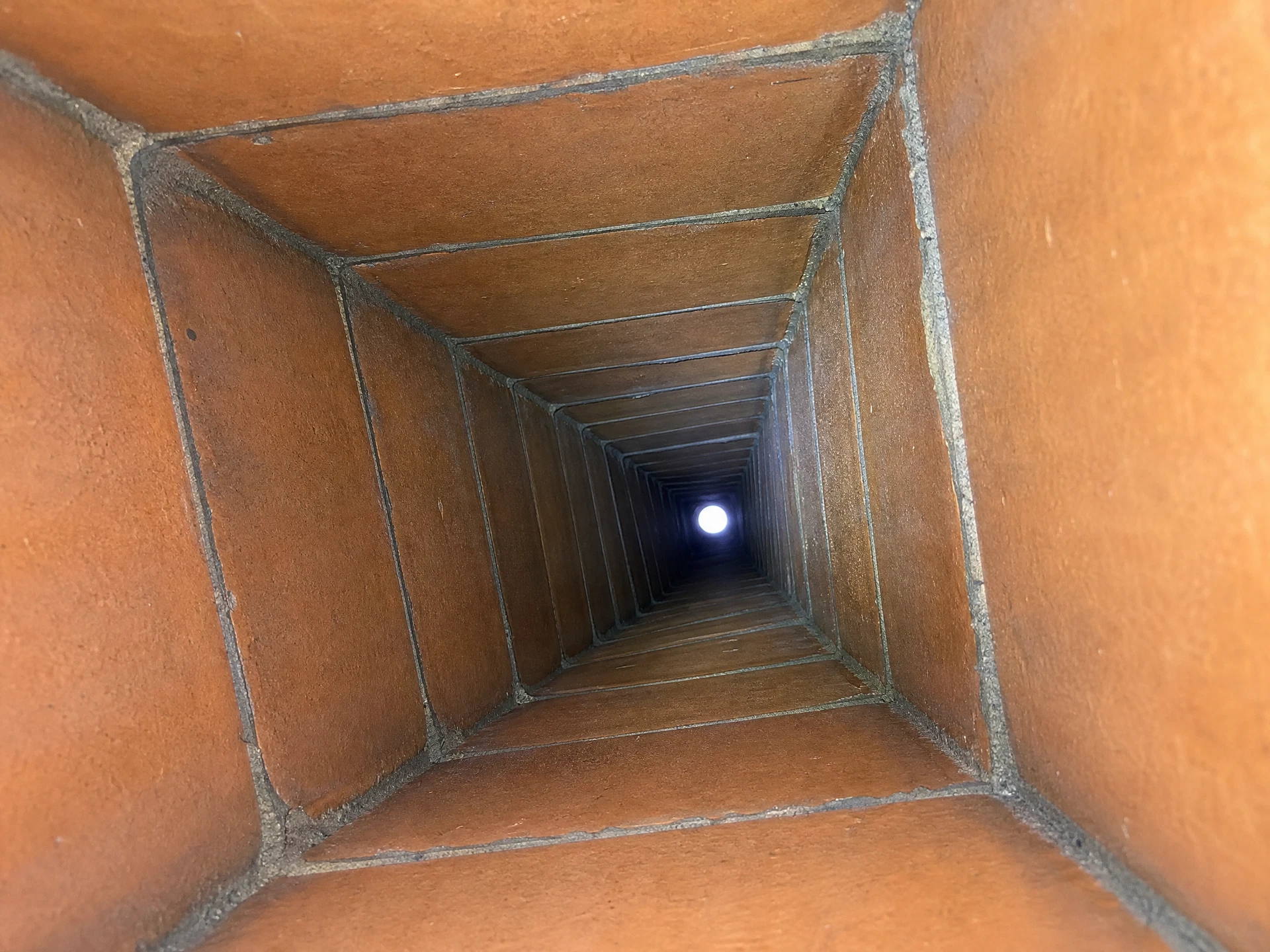 Same chimney flue spotless after professional sweeping