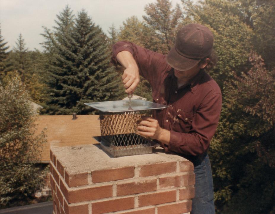 Noble Chimney technician — Cap & Crown Installation